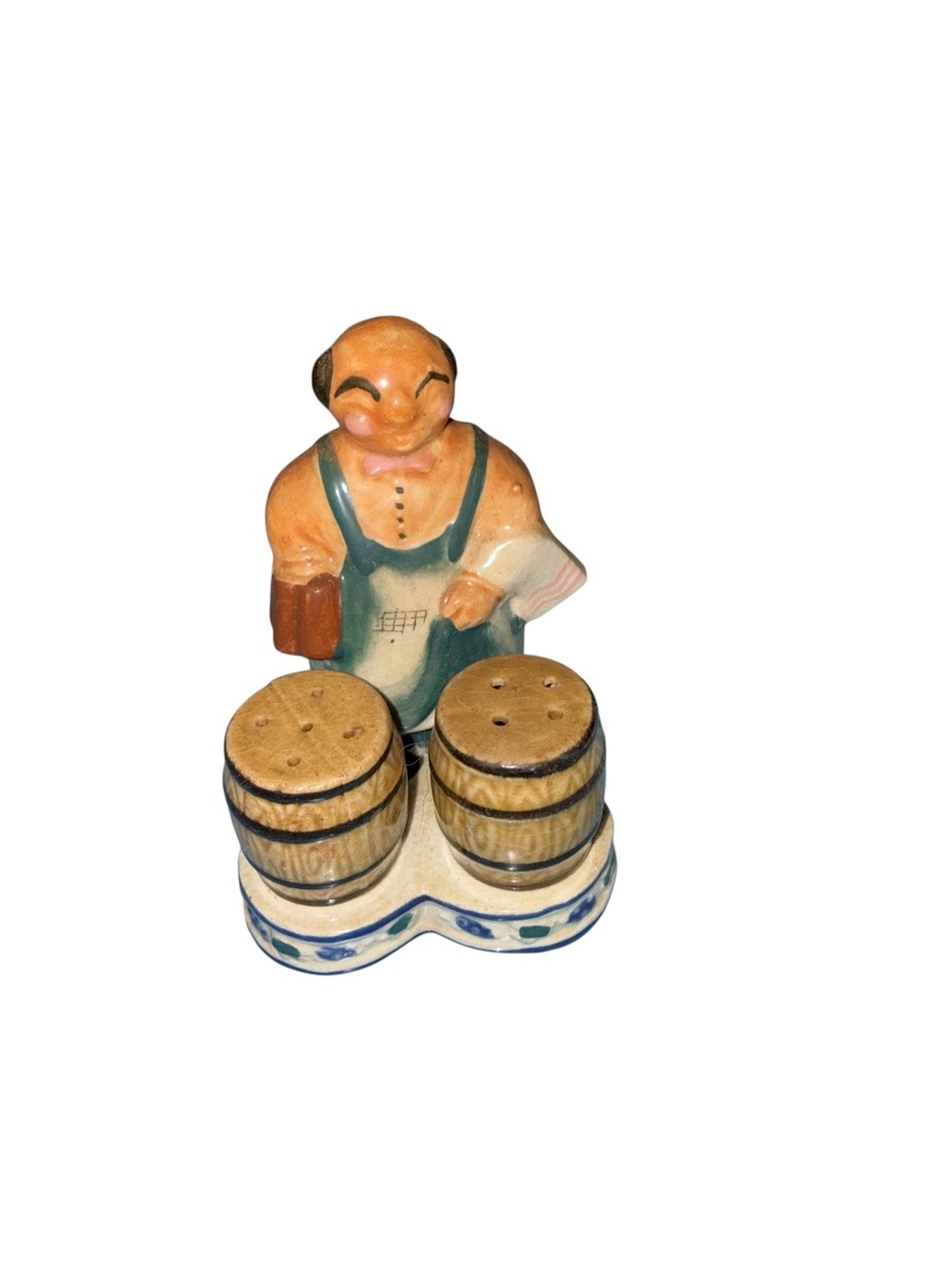 Vintage bartender with barrel salt and pepper shakers